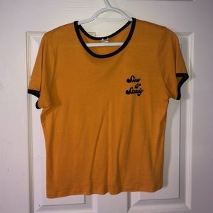 yellow t-shirt with black edging